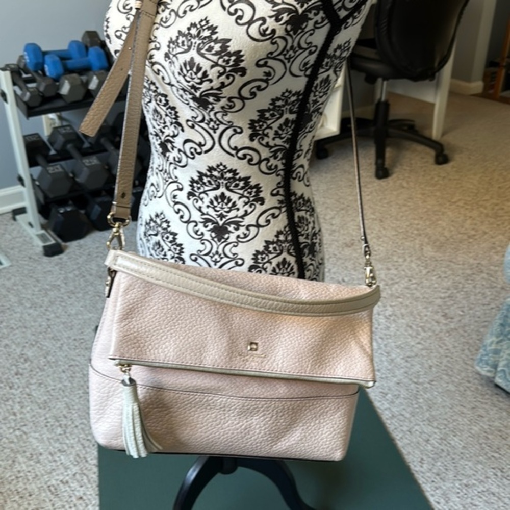 Kate Spade pink crossbody purse.